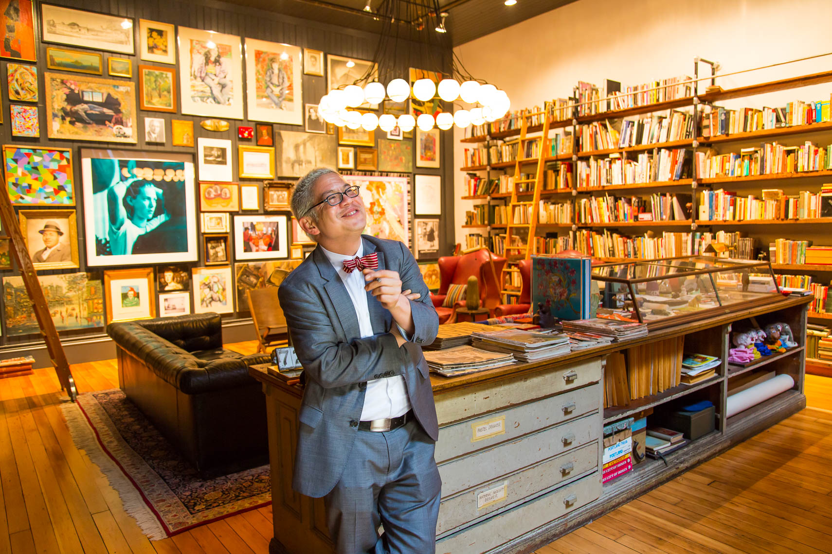 Thomas Lauderdale of the famed band Pink Martini at his home in Portland, Oregon, surrounded by his collections.